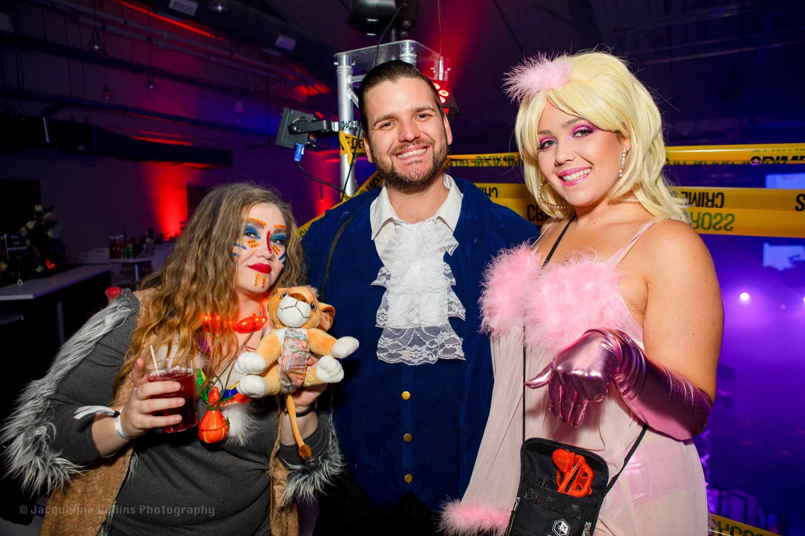 Adults in creative Halloween costumes at Coloween, the Denver Halloween Party